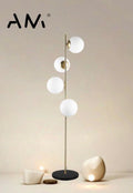 Lampada da terra con 4 sfere in vetro